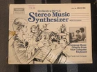 Vtg Tandy Cat #26-3143 ORCHESTRA-90 Cc Stereo Music Synthesizer W/book Brand New. Price: $200.00.
