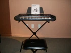 Casio CTK-401 Portable Keyboard Synthesizer 49 Keys + Stand, Stool,adapter,rack Used. Price: $75.00.