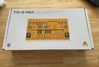 Behringer TD-3-AM Analog Bass Line Desktop Synthesizer Yellow Tested New. Price: $220.00.