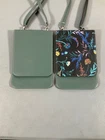Caseable 2-PIECE Crossbody Bag Set Floral & Solid Green, Adjustable Straps, Mu New. Price: $15.99.