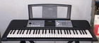Yamaha PSR-E233 (61 Key) Digital Keyboard! Includes Adapter + Sustain Pedal! Used. Price: $100.00.