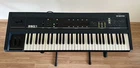 Ensoniq ESQ-1 Analog/digital Polyphonic Synthesizer Workstation W/ Cartridge Used. Price: $699.99.