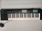 Yamaha PSR-12 33.5" Keyboard Very Nice Shape With Power Cord Tested Used. Price: $50.00.