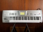 Korg Trinity V3 Music Workstation 61 Key Z1 Moss W/ Case Used. Price: $1500.00.