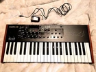 Dave Smith Mopho X4 Analog Poly Synth Keyboard Curtis Filter Wood Sides Used. Price: $1500.00.