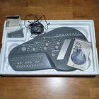 Suzuki Omnichord System OM-200M Keyboard Synthesizer Grey. Price: $650.00.