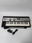 Microkorg Xl Vintage Synthesizer Vocoder Keyboard+mic+ Ac Adapter 02320 Used. Price: $278.00.