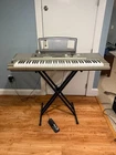 Yamaha YPG-235 76-KEY Portable Grand Piano Keyboard W/ Stand, Pedal & Adapter Used. Price: $195.00.