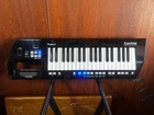 Roland Lucina AX-09 37-KEY Keytar Synthesizer Black W/ Box Used. Price: $600.00.