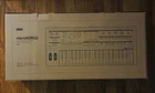 Microkorg 2 Keyboard Synthesizer & Vocoder Limited Edition Whte Decksaver New. Price: $550.00.