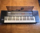 Lowrey V-101 Micro Genie Vintage Keyboard Synthesizer For Parts Repair. Price: $49.99.