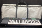 Yamaha 49 Keys Electronic Keyboard Model PSR-12 Soft Case & Ac Cord Works Used. Price: $58.66.